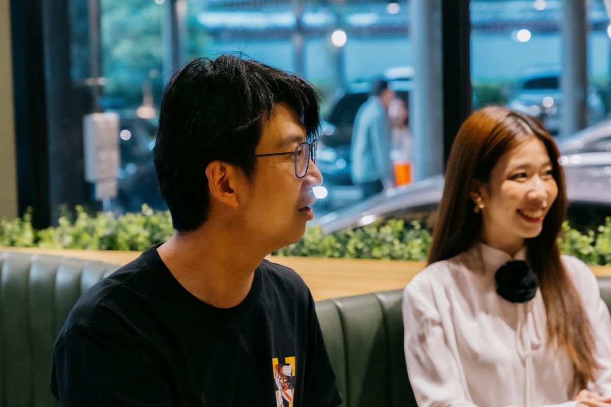 Members listening intently during a Flow's Table dinner conversation